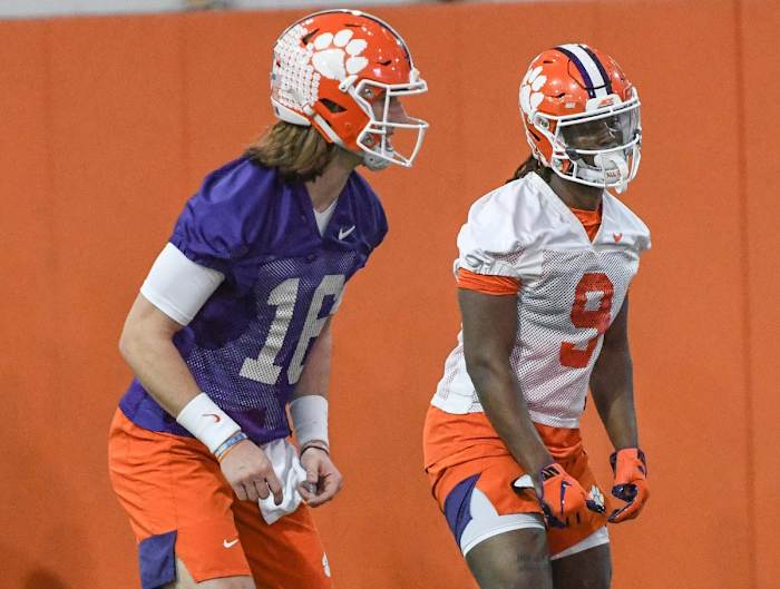 Trevor Lawrence, left, and Travis Etienne